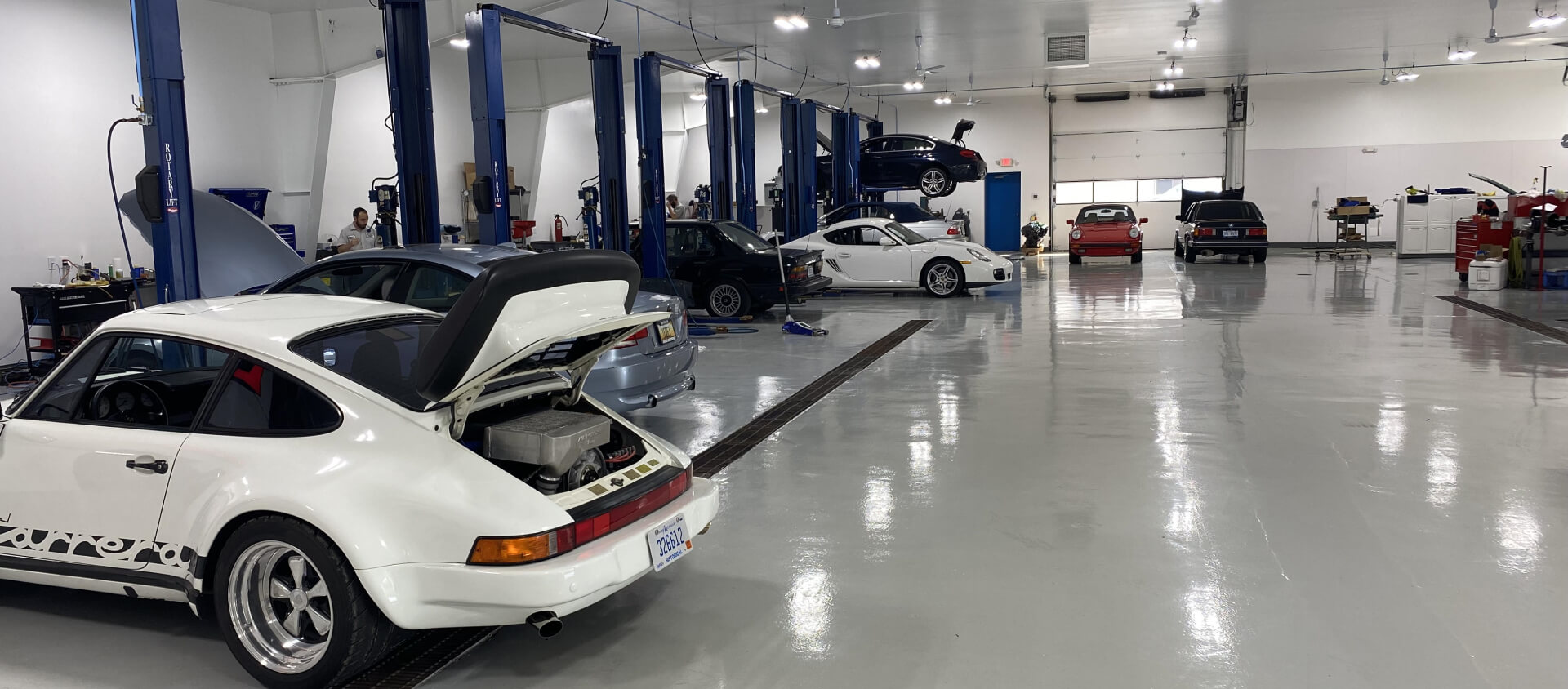 Cars Inside Nikolas Motorsport Garage For Repair